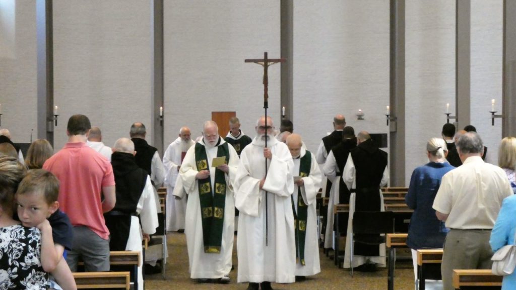 Visitors return for liturgy - Abbey of Gethsemani